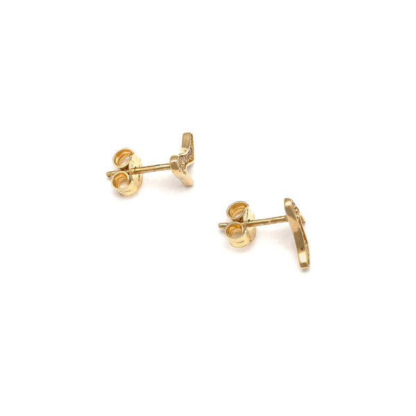 Aretes diseño especial motivo zapatilla con circonias en oro amarillo 14 kilates.