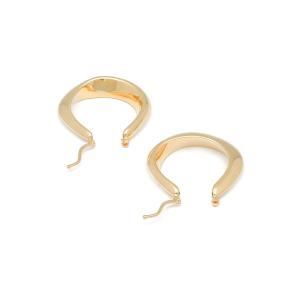 Arracadas lisas huecas en oro amarillo 14 kilates.