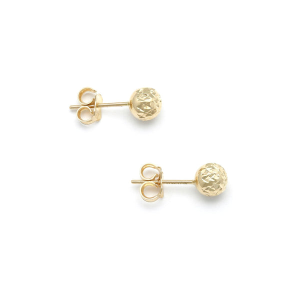 Aretes facetados en oro amarillo 14 kilates.