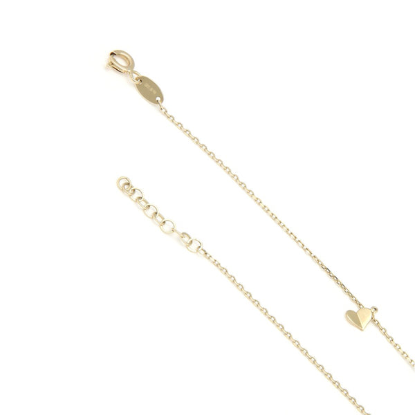 Pulsera eslabón cruzado con aplicación y colgante motivo corazones en oro amarillo 14 kilates.
