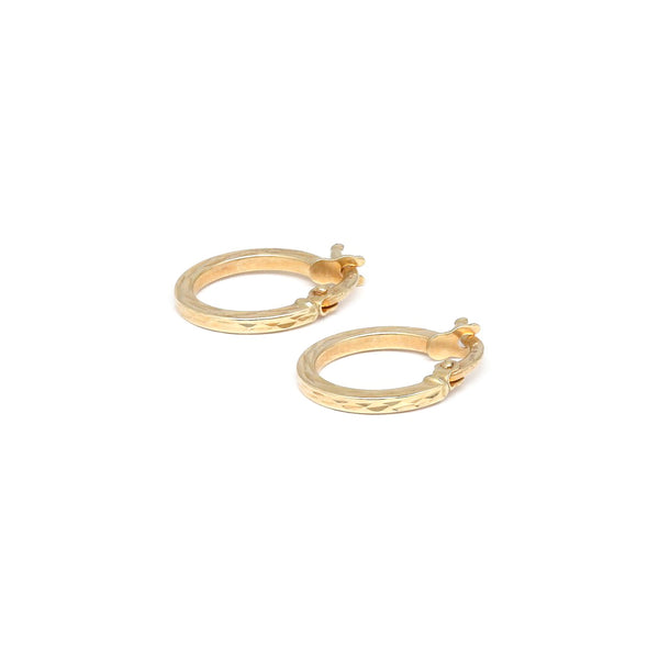 Arracadas facetadas en oro amarillo 14 kilates.