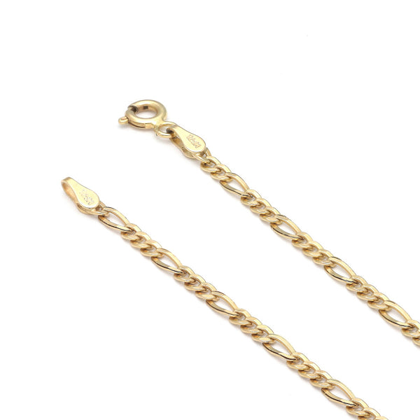 Pulsera de tres eslabones por uno en oro amarillo 14 kilates.
