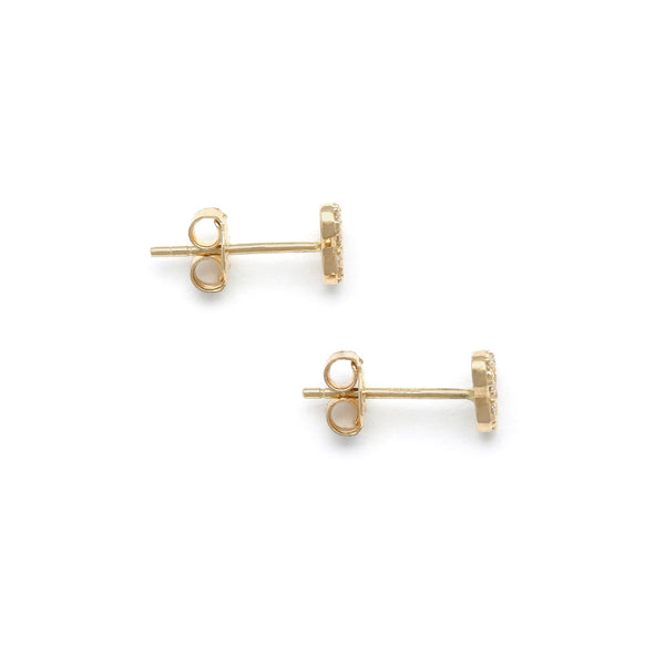 Aretes diseño especial motivo corazón con circonias en oro amarillo 14 kilates.