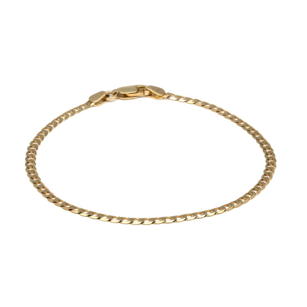 Pulsera eslabón barbado en oro amarillo 14 kilates.