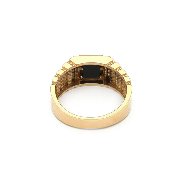 Anillo tipo sello con sintético en oro amarillo 14 kilates.