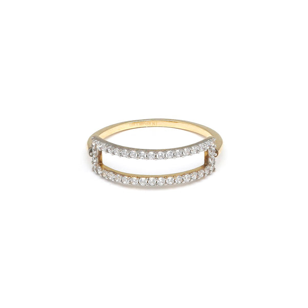 Anillo calado con circonias en oro amarillo 14 kilates.
