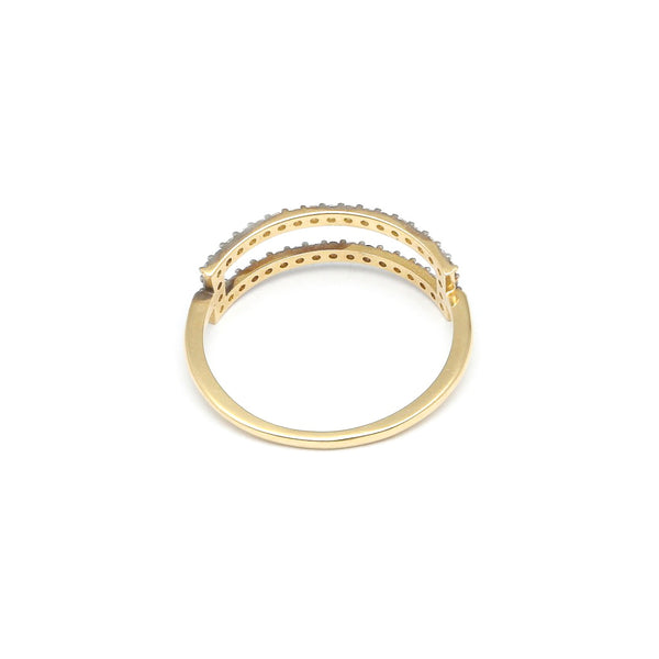 Anillo calado con circonias en oro amarillo 14 kilates.