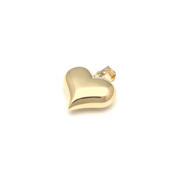 Dije hueco motivo corazón en oro amarillo 14 kilates.