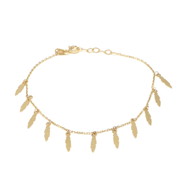 Pulsera eslabón cruzado con colgantes motivo plumas en oro amarillo 14 kilates.