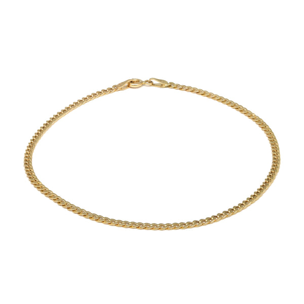 Tobillera eslabón barbado en oro amarillo 14 kilates.