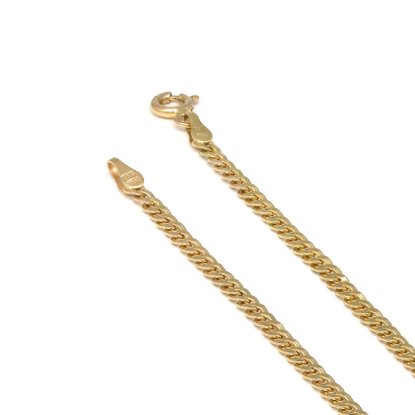 Tobillera eslabón barbado en oro amarillo 14 kilates.
