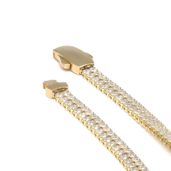 Pulsera eslabón articulado con circonias en oro amarillo 14 kilates.