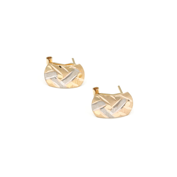 Aretes diseño especial en oro amarillo 14 kilates.