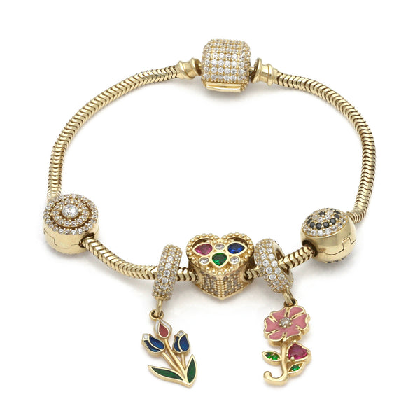 Pulsera eslabón articulado con aplicación y colgantes motivo figuras diferentes con sintéticos y esmalte en oro amarillo 14 kilates.