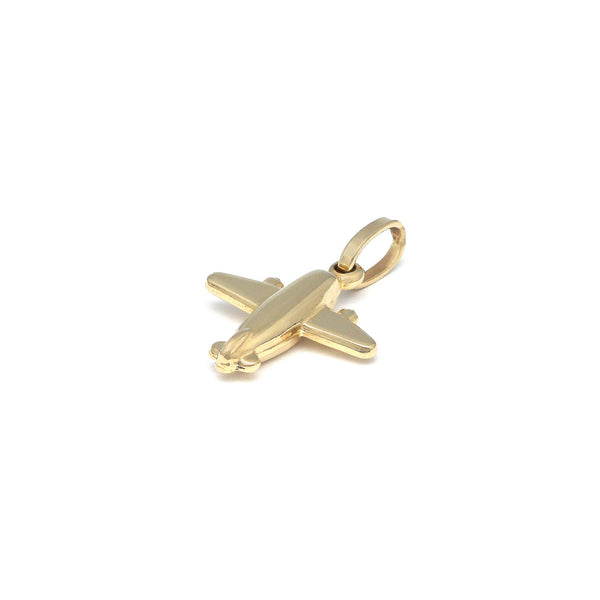 Dije hueco motivo avión en oro amarillo 14 kilates.