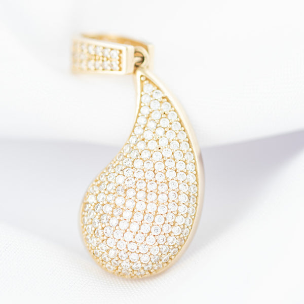 Dije diseño especial motivo gota con circonias en oro amarillo 14 kilates.