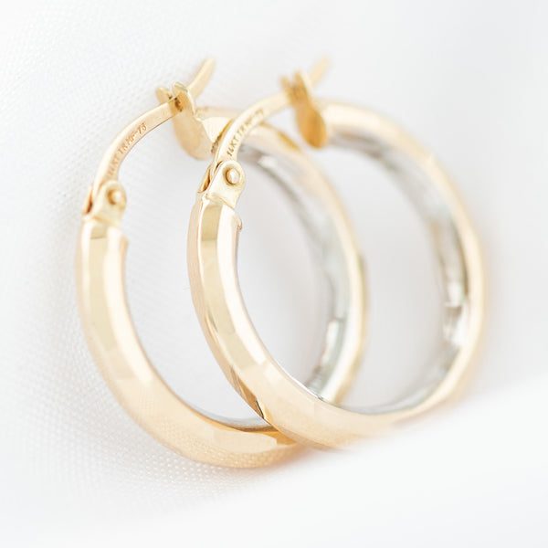 Arracadas diseño especial en oro dos tonos 14 kilates.
