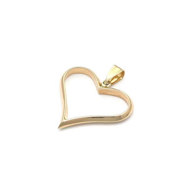 Dije hueco motivo corazón en oro amarillo 14 kilates.