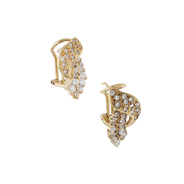 Aretes diseño especial con circonias en oro amarillo 14 kilates.