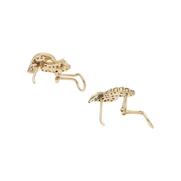 Aretes diseño especial con circonias en oro amarillo 14 kilates.