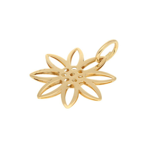 Dije hueco motivo flor en oro amarillo 18 kilates.