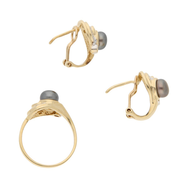 Juego anillo y aretes diseño especial con perlas y sintéticos en oro amarillo 14 kilates.