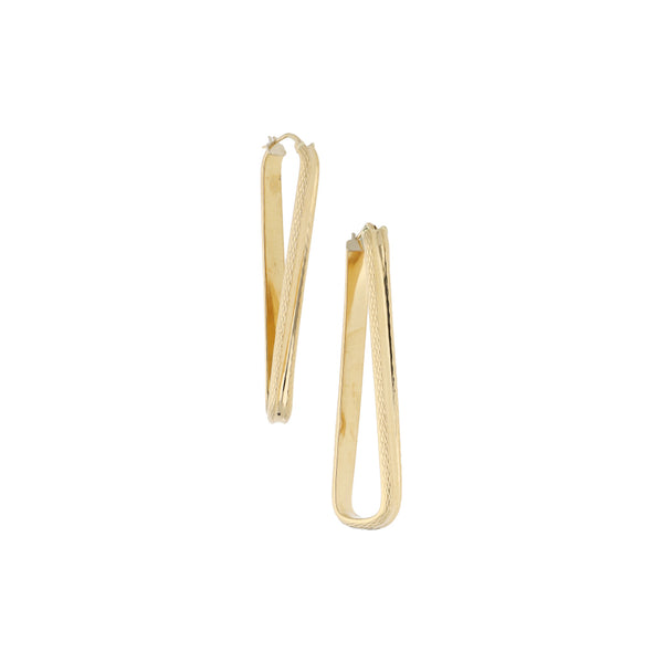 Arracadas estilizadas en oro amarillo 14 kilates.