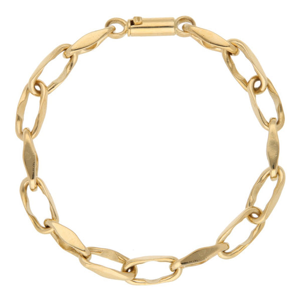 Pulsera eslabón cruzado en oro amarillo 18 kilates.