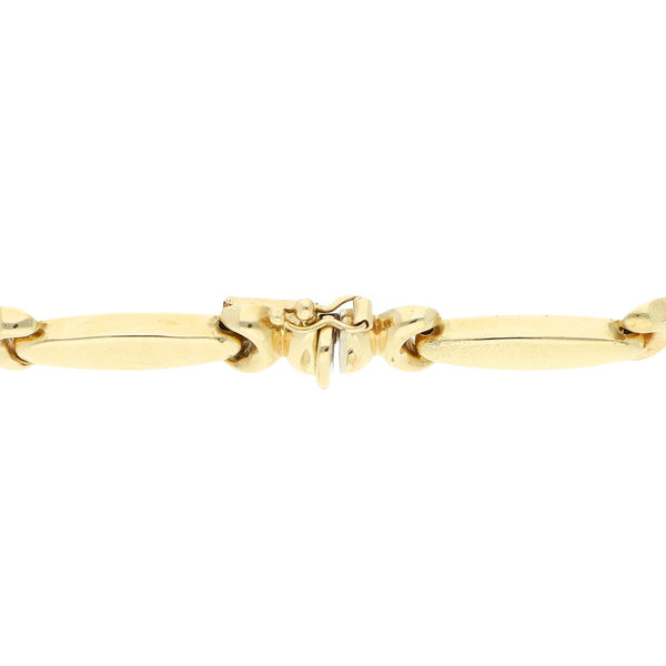 Pulsera eslabón articulado en oro amarillo 14 kilates.