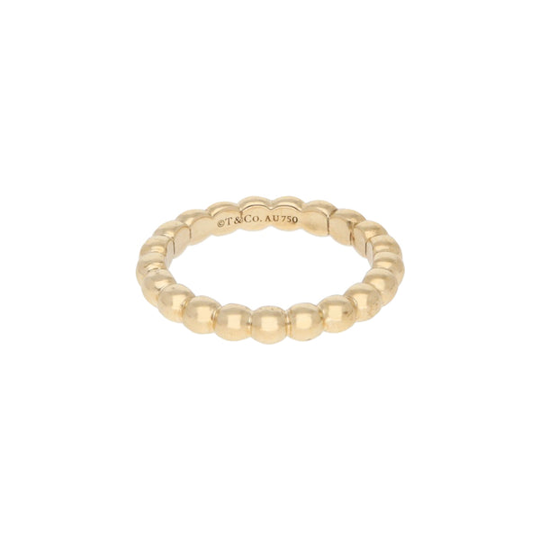 Argolla diseño especial firma Tiffany & Co. en oro amarillo 18 kilates.