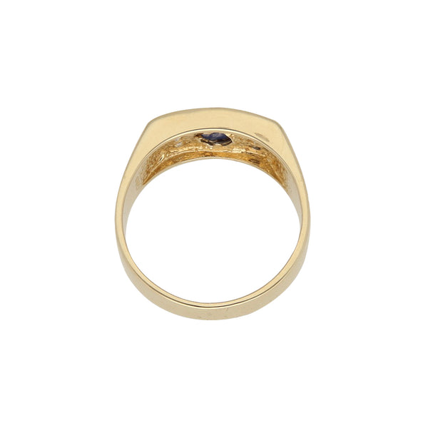 Anillo diseño especial con zafiro estrella y circonias en oro amarillo 14 kilates.