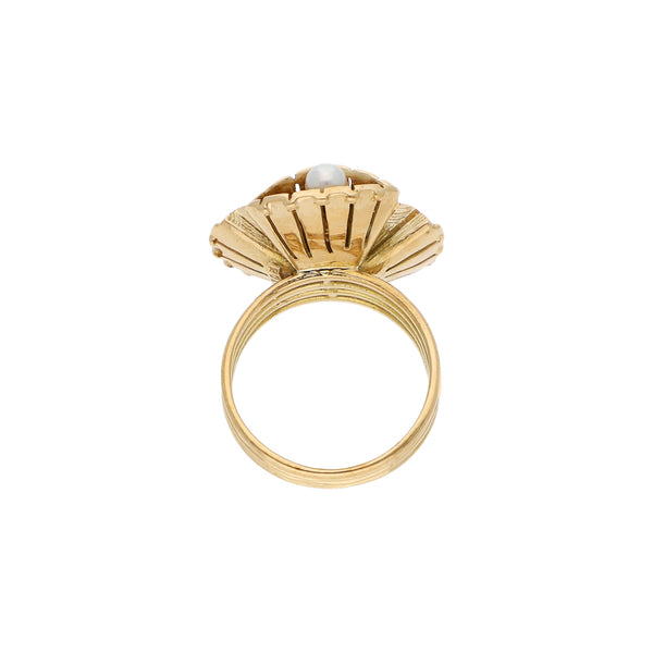 Anillo diseño especial con sintéticos en oro amarillo 18 kilates.