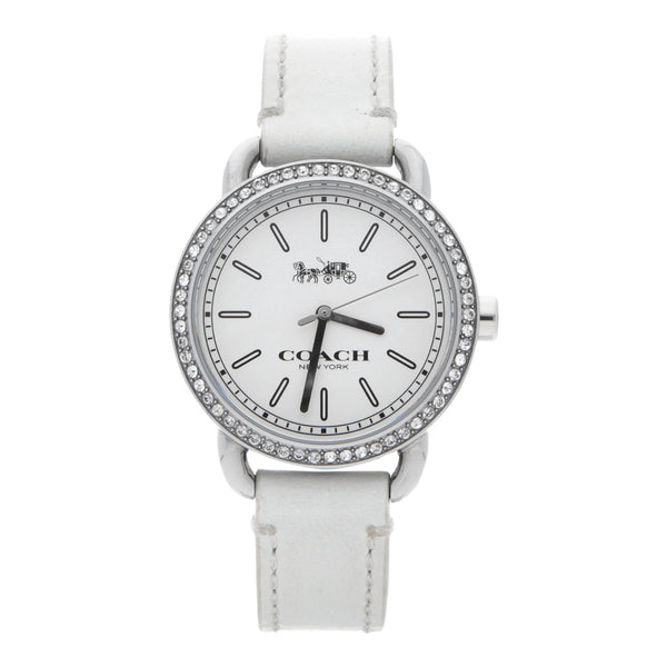 Reloj Coach para dama en acero inoxidable.
