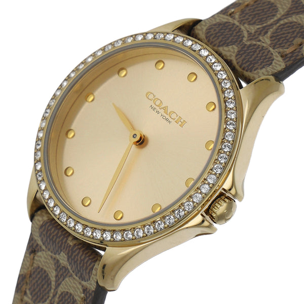 Reloj Coach para dama en acero chapa correa piel.