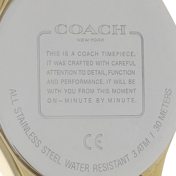 Reloj Coach para dama en acero chapa correa piel.
