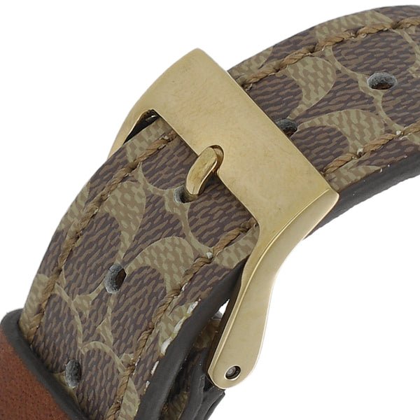 Reloj Coach para dama en acero chapa correa piel.