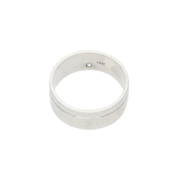 Argolla lisa con circonia en oro blanco 14 kilates.