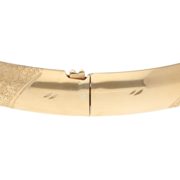 Pulsera de arillo articulada en oro amarillo 14 kilates.