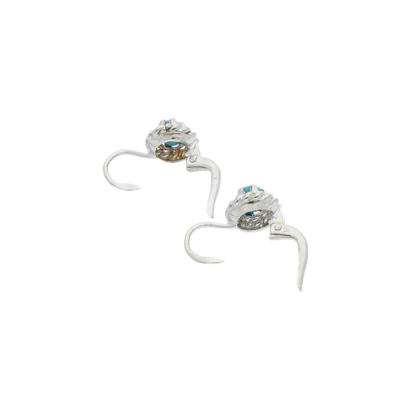 Aretes diseño especial con turquesas en oro blanco 18 kilates