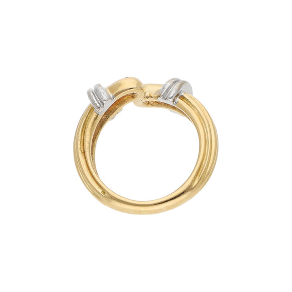 Anillo estilizado firma Tane en oro dos tonos 18 kilates.