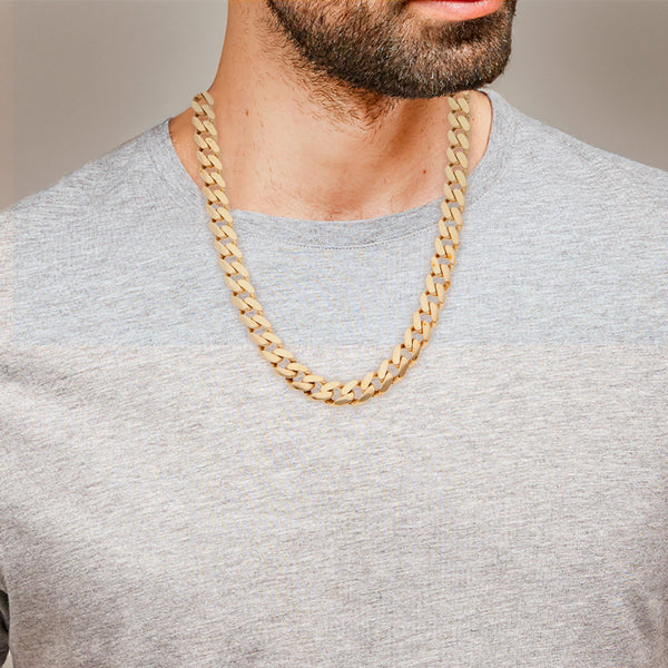 Collar eslabón encontrado con aplicación motivo cráneo y sintéticos en oro amarillo 14 kilates