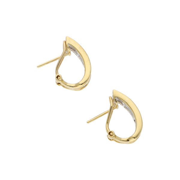 Aretes diseño especial con diamantes en oro amarillo 18 kilates.