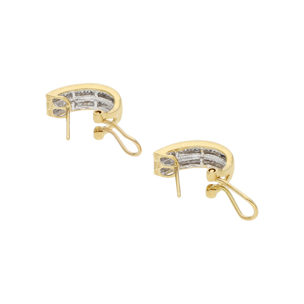 Aretes diseño especial con diamantes en oro amarillo 18 kilates.