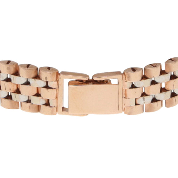 Pulsera eslabón articulado en oro dos tonos 14 kilates.