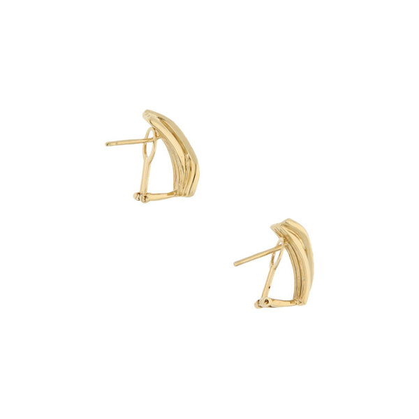 Aretes estilizados con diamantes en oro amarillo 14 kilates.