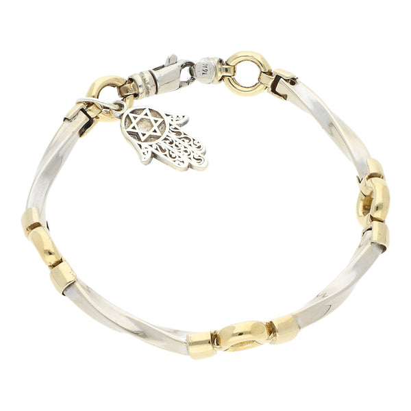 Pulsera eslabón articulado, con colgante motivo mano en oro dos tonos 14 kilates.