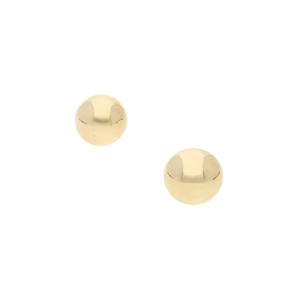 Aretes lisos motivo media esfera en oro amarillo 14 kilates.