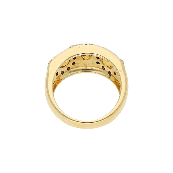 Anillo diseño especial con diamantes y sintéticos en oro amarillo 18 kilates.