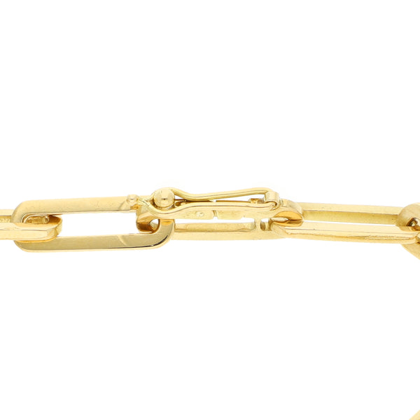 Pulsera eslabón cruzado en oro amarillo 18 kilates.