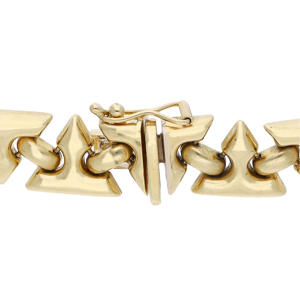 Pulsera eslabón articulado en oro amarillo 14 kilates.